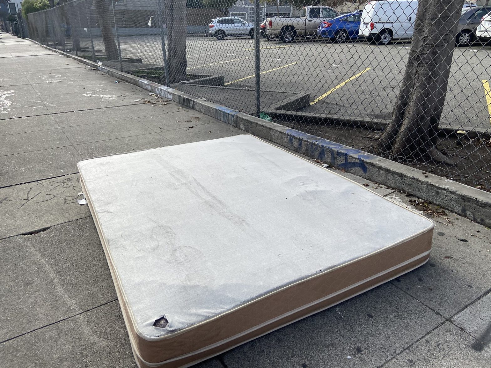 San Francisco residents navigate sidewalks filled with increasing piles