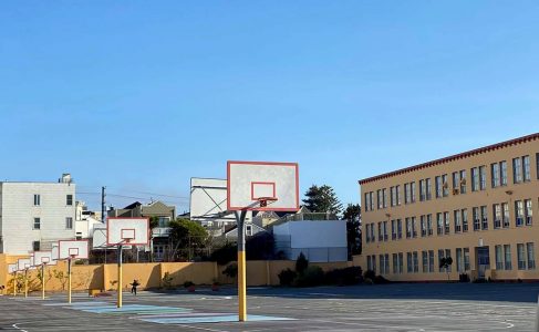 Practicing Tai Chi on the basketball courts at Everett