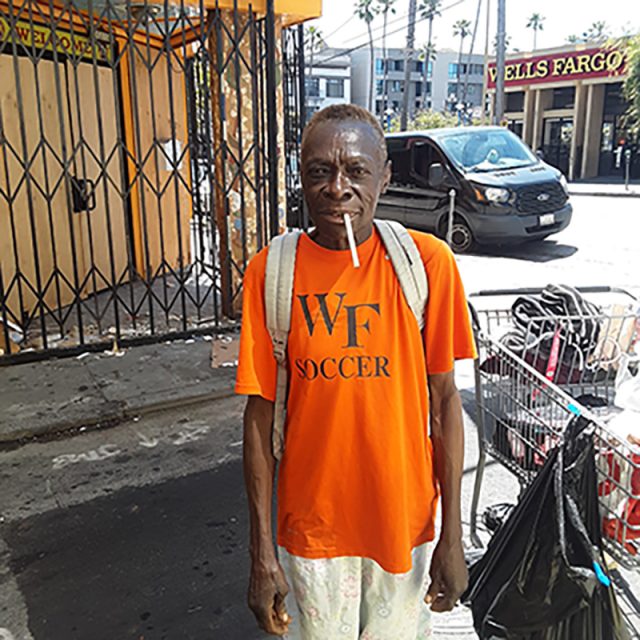 Thomasa Duarte in an orange tshirt on 15th Street