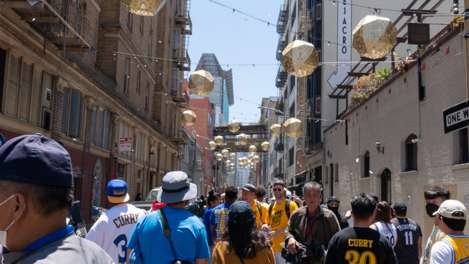 Warriors fans leave after the parade finishes