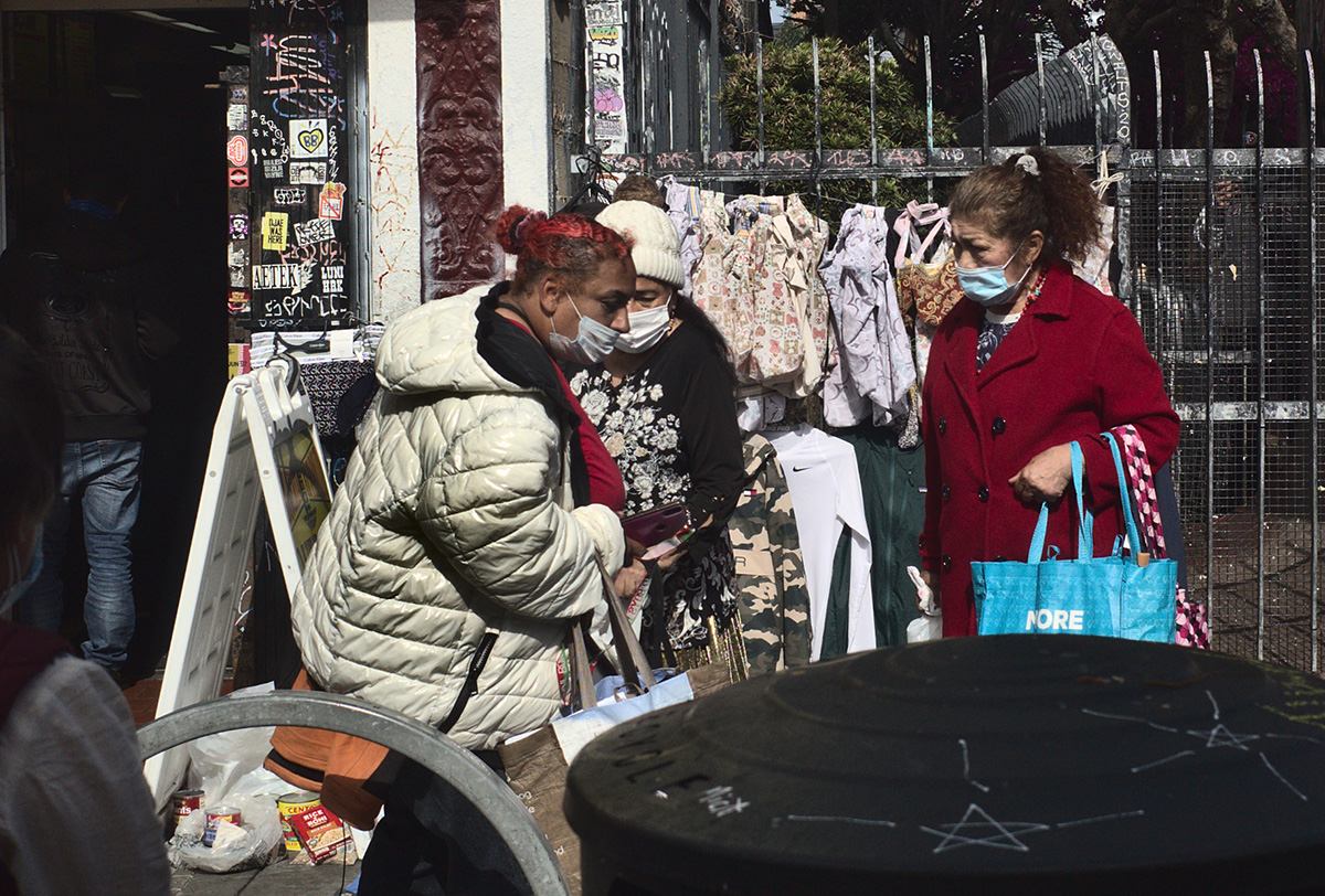 Woman haggling on Mission Street