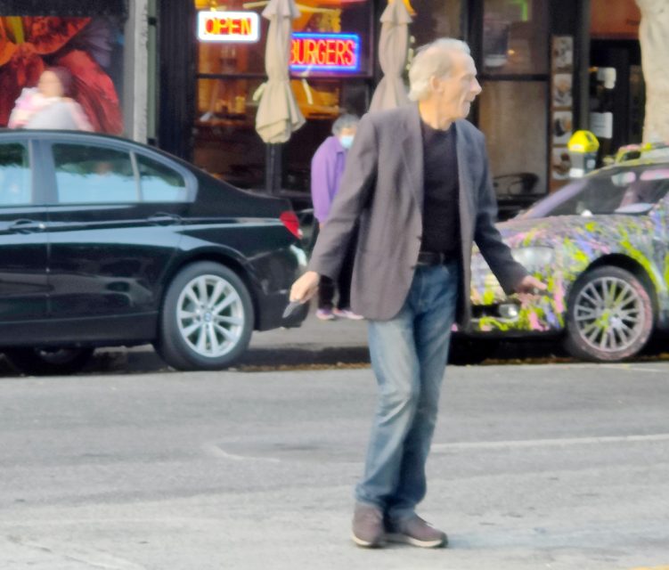 A man in the middle of the street.