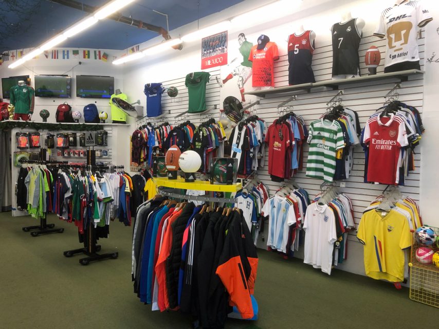 Inside a sporting good store selling soccer