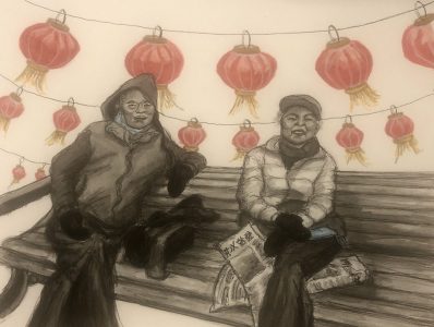 Two women siting on a bench