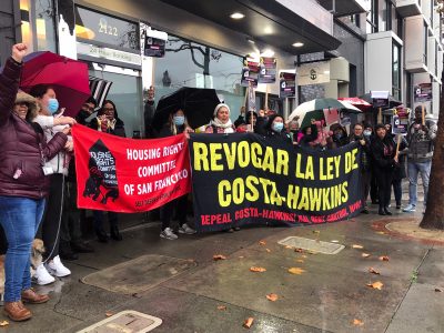 Twenty people showed up at 2120 Market Street in the rain to support the family last Thursday. Photo by Chuqin Jiang