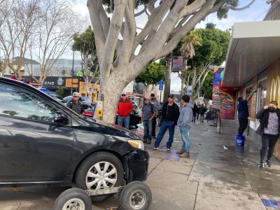 Car on sidewalk 24th Street Mcdonalds