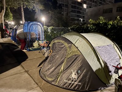 Tents on the roadside at night