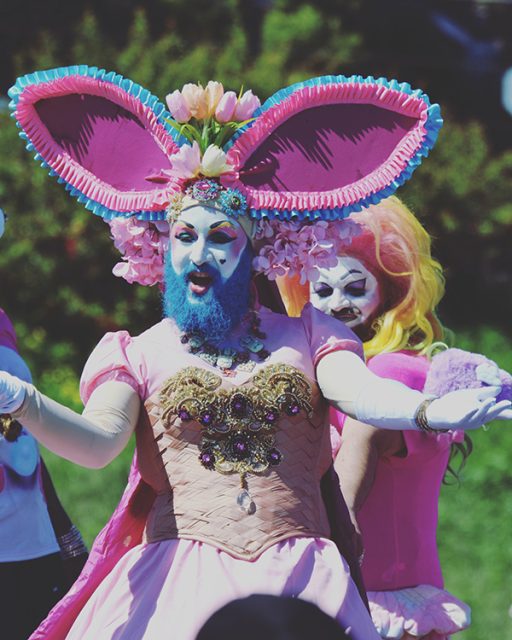 Someone wearing huge pink bunny ears.