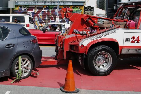 a couple of vehicles including at two truck
