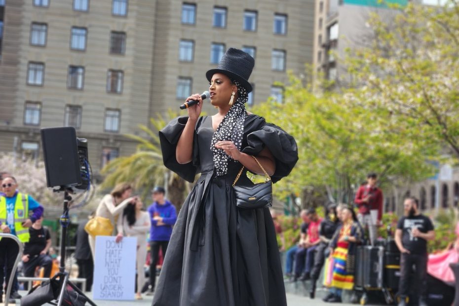 One-time supervisorial candidate Honey Mahogany spoke to the crowd at Union Square.
