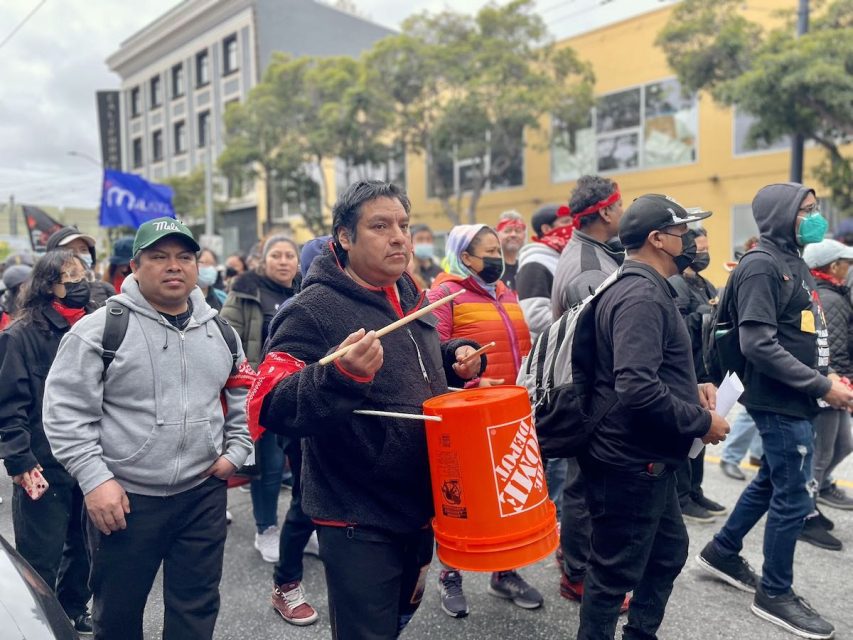 a large group of demonstrators on International Workers' Day