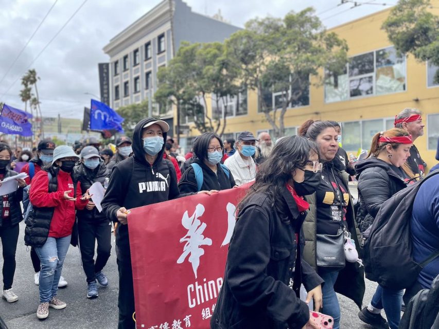 a large group of demonstrators on International Workers' Day