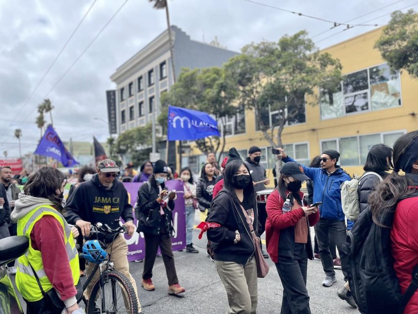 a large group of demonstrators on International Workers' Day