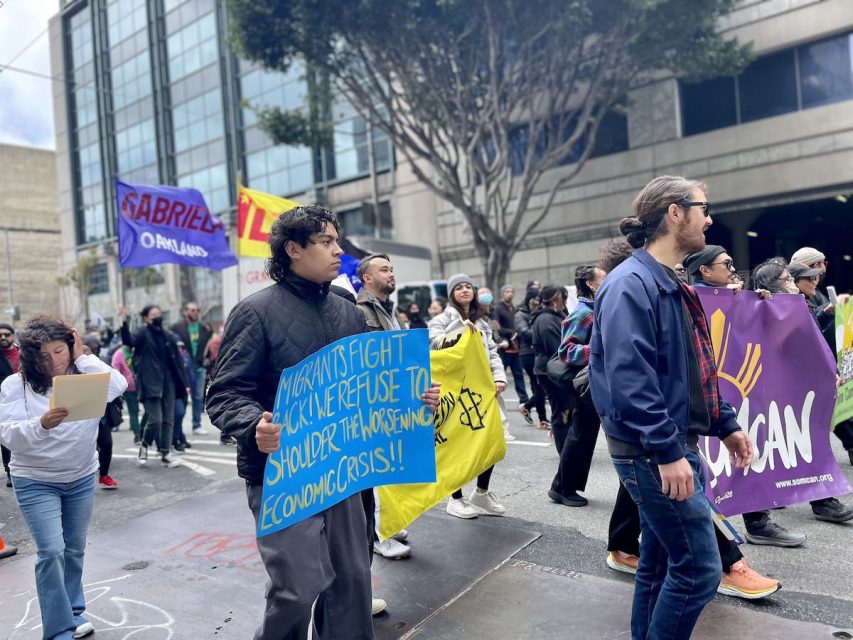a large group of demonstrators on International Workers' Day