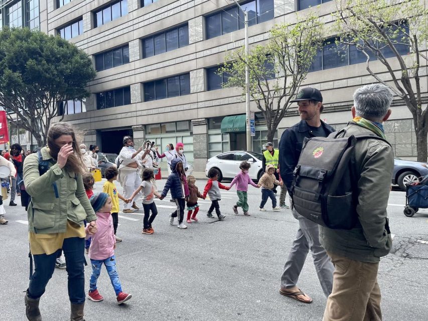 a large group of demonstrators on International Workers' Day