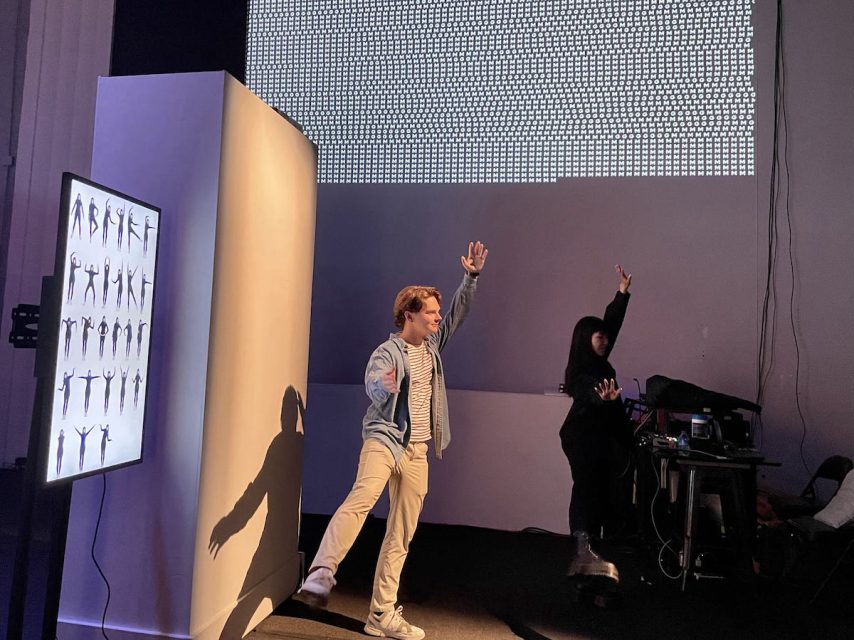 Two people doing the same pose