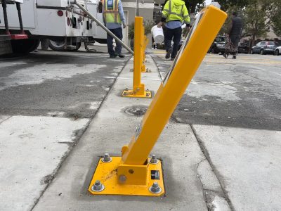 a damaged and slanted bollard
