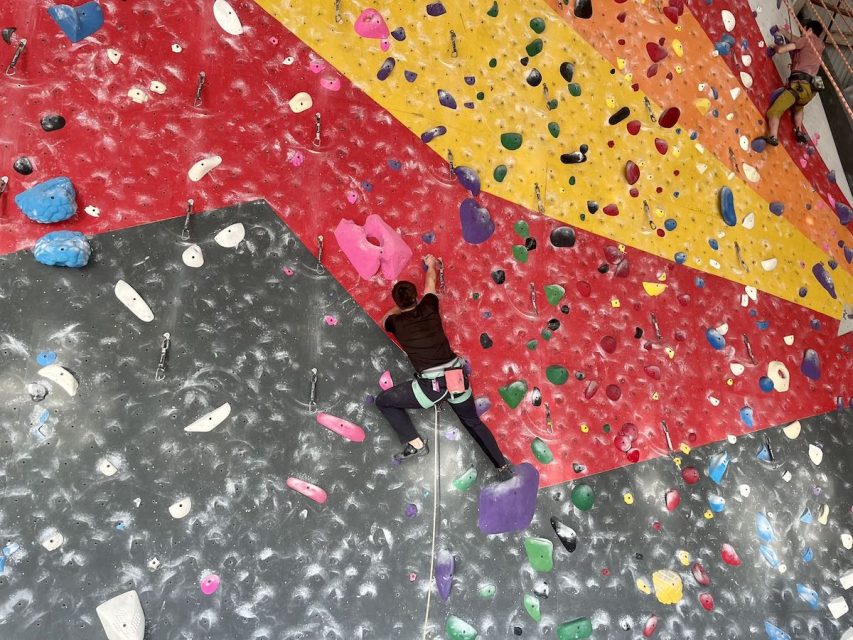 A person climbing with a rope