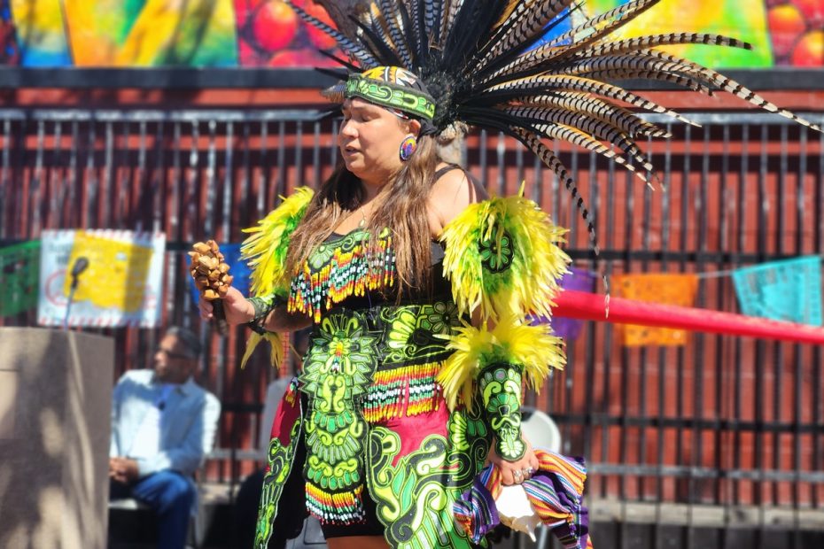A traditional dancer on the 24th and Mission plaza.