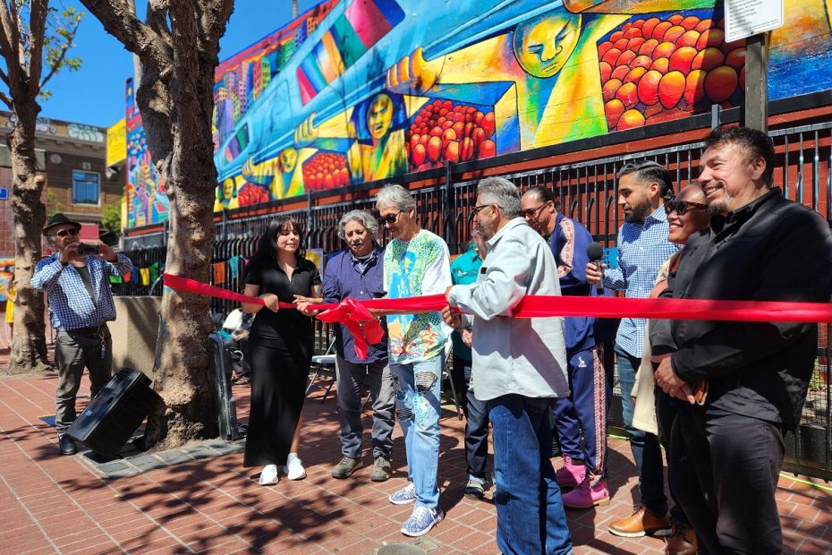 Michael Rios cutting the ribbon at the 24th and Mission plaza.