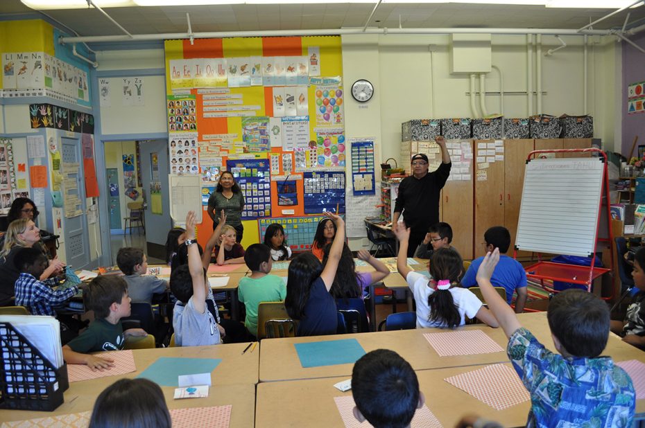 A group of children in a classroom.