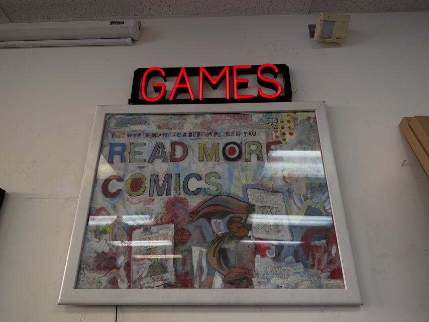 An artwork that says read more comics.