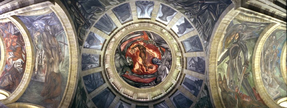 A panoramic view of a vaulted ceiling fresco with vivid colors and dynamic figures.