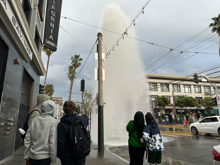 A fire hydrant gushing water into the air at 16th and Mission streets