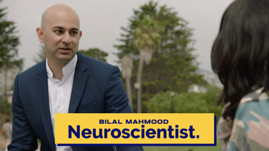Bilal Mahmood in conversation, identified as a neuroscientist, with a subtitle across the image.